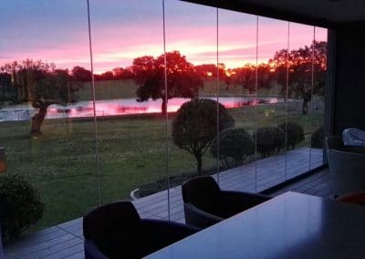 Instalacion de Cortinas de Cristal en Porche 1