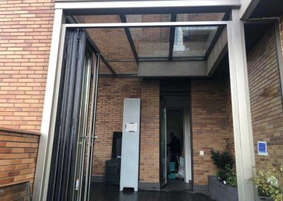 TECHO FIJO CON CERRAMIENTO VERTICAL REPLEGABLE EN TERRAZA DE MADRID CENTRO 1
