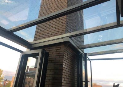 TECHO FIJO CON CERRAMIENTO VERTICAL REPLEGABLE EN TERRAZA DE MADRID CENTRO 3